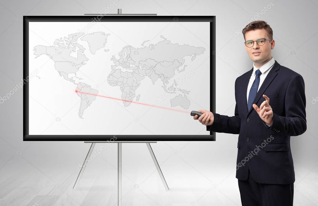 Businessman presenting potential business area on map