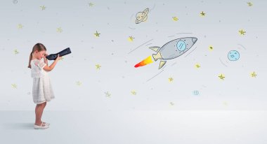 Çocuk hayali roketler için spyglass üzerinden seyir