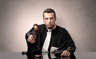 Oldscool young judge in gown clipart