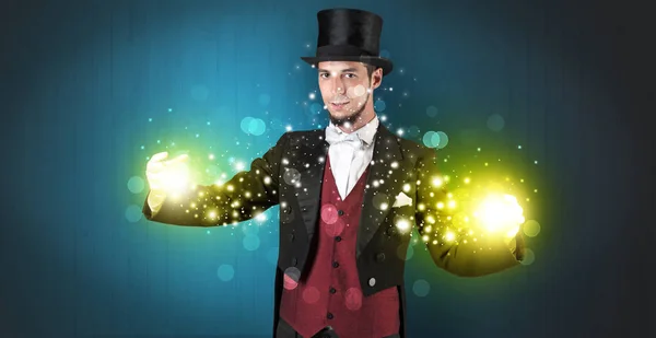 Illusionist holding superpower on his hand — Stock Photo, Image