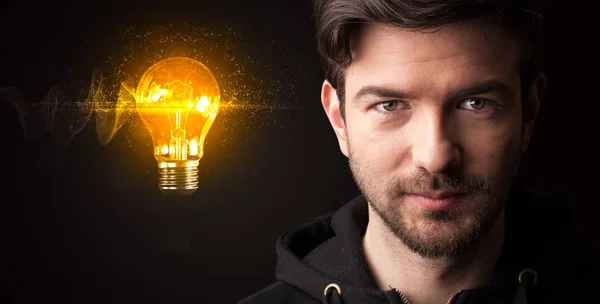 Portrait of a young businessman on dark background — Stock Photo, Image