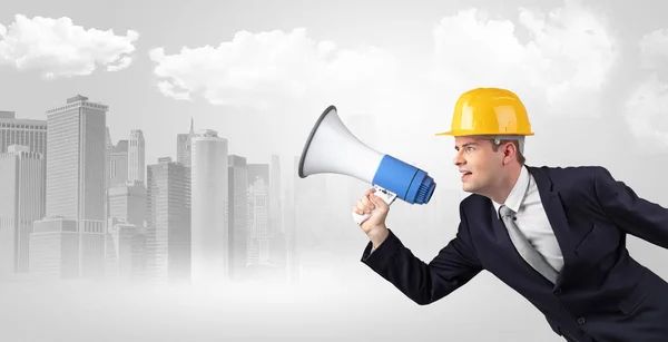 Architect standing and yelling to far big city panorama — Stock Photo, Image