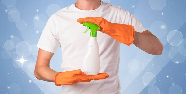 Glittered background with male housekeeper — Stock Photo, Image