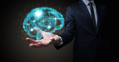 İnsan beyni elinde tutan adam