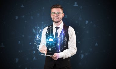 Güvenli bulut kavramı ile işadamı ve tablet