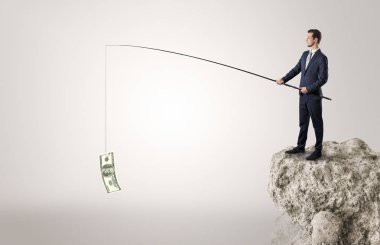 İşadamı Balık tutma Doları bir rock