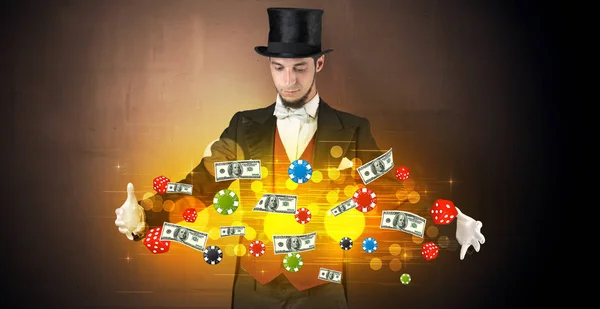 Illusionisten trolla med handen gambling staber — Stockfoto