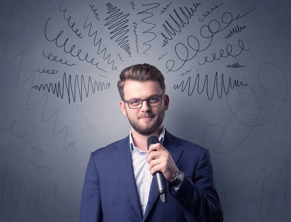 Businessman holding microphone — Stock Photo, Image