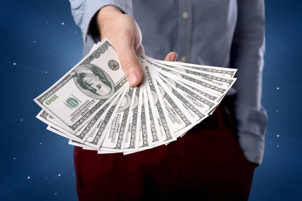 Businessman holding money — Stock Photo, Image