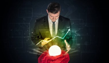 İşadamı borsa sihirli bir top ile geleceği tahmin