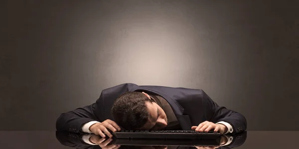 Businessman fell asleep at his workplace