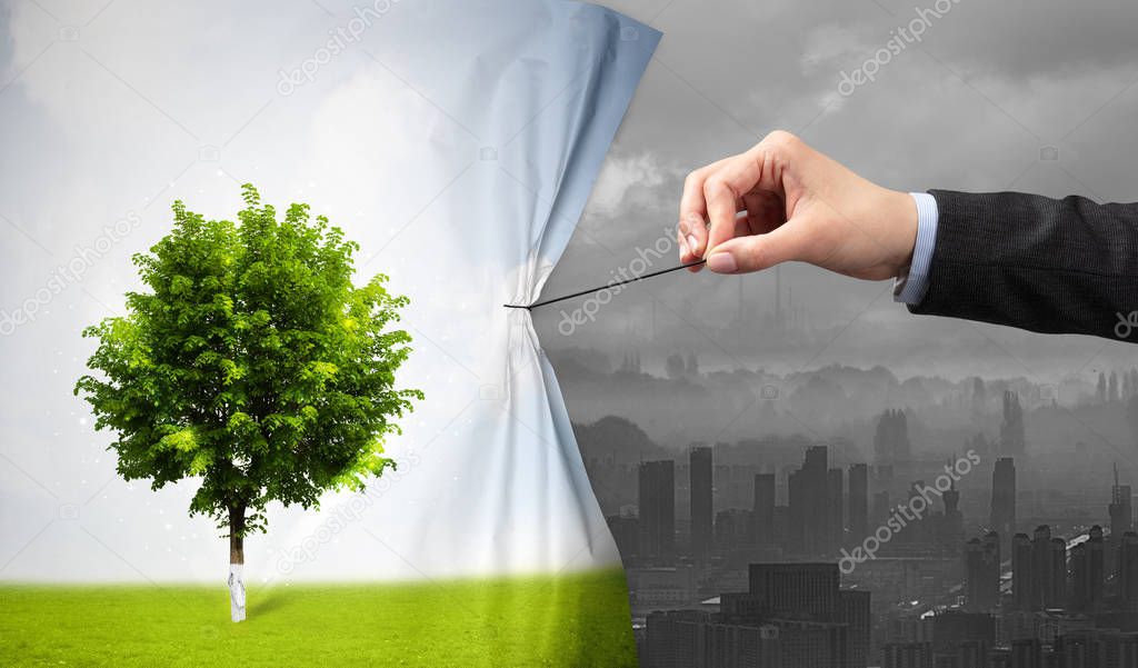 hand pulling nature cityscape curtain to gray cityscape