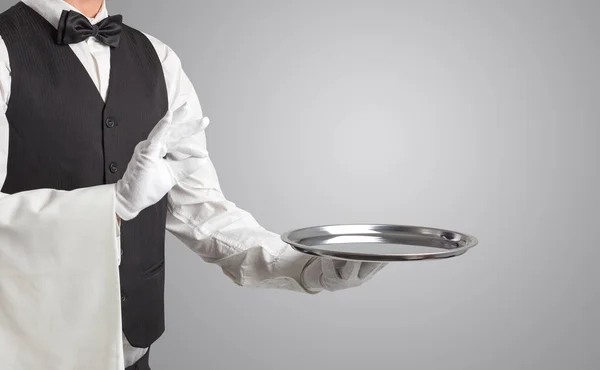 Waiter serving with white gloves and steel tray — Stock Photo, Image