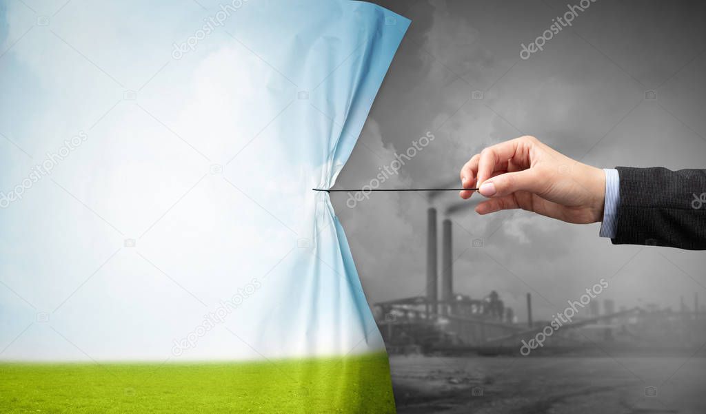 hand pulling nature cityscape curtain to gray cityscape