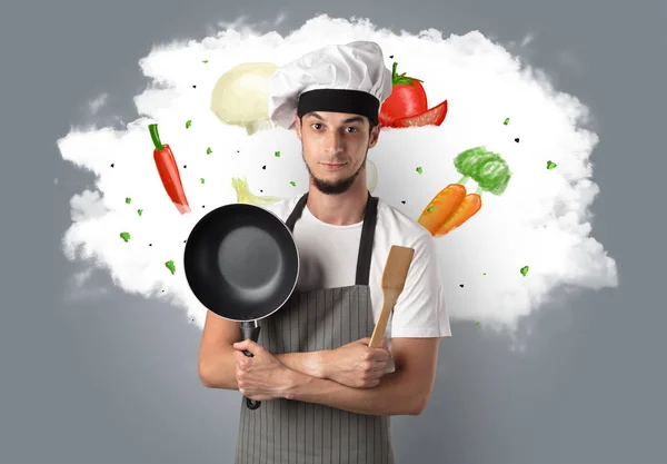 Grönsaker på molnet med manliga cook — Stockfoto