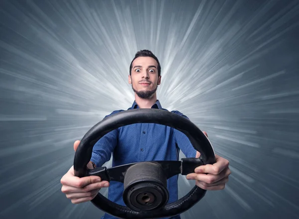 Man holding steering wheel — Stock Photo, Image