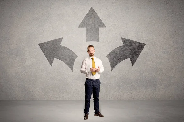 Businessman standing with three arrows — Stock Photo, Image