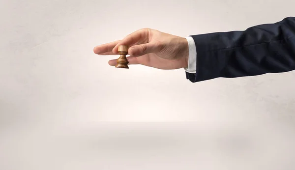 Big hand taking his next step on chess game — Stock Photo, Image