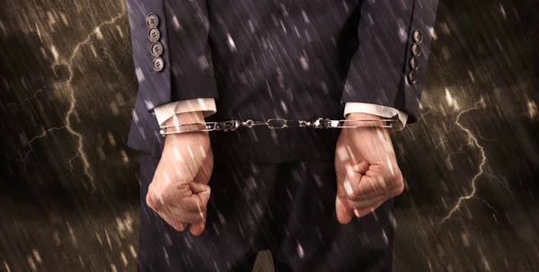 Stormy wallpaper with close handcuffed man — Stock Photo, Image