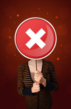 Tutan kadın x işareti