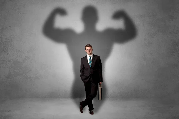 Empresário com sombra muscular nas costas — Fotografia de Stock