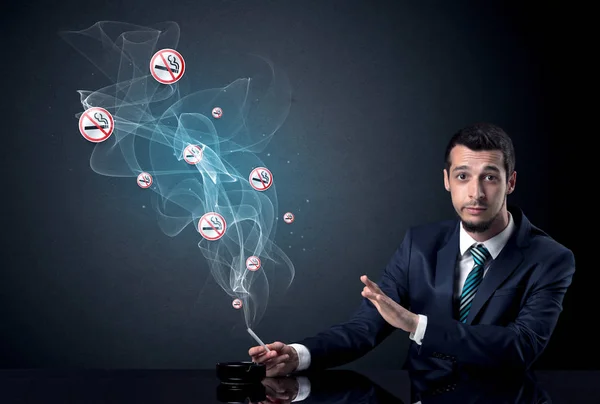 Businessman smoking concept — Stock Photo, Image