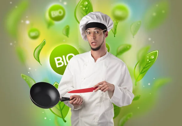 Bio bladeren concept en cook portret — Stockfoto