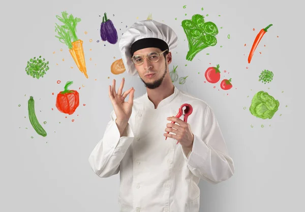 Kock med färgglada dras grönsaker — Stockfoto