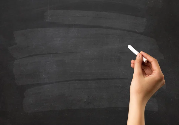 Hand holding chalk — Stock Photo, Image