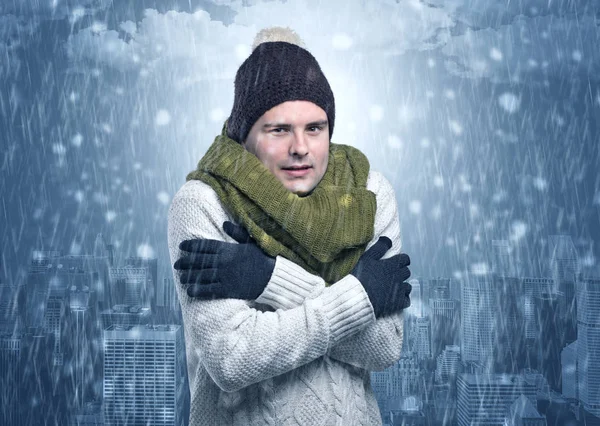 Boy freezing in cold weather with city concept — Stock Photo, Image