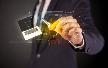 Grafikleriyle tuşu tutmakta işadamı