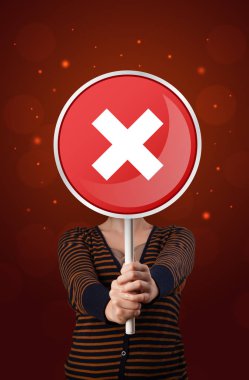 Tutan kadın x işareti