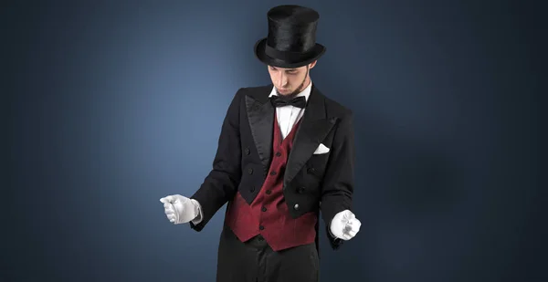 Magician holds something invisible — Stock Photo, Image