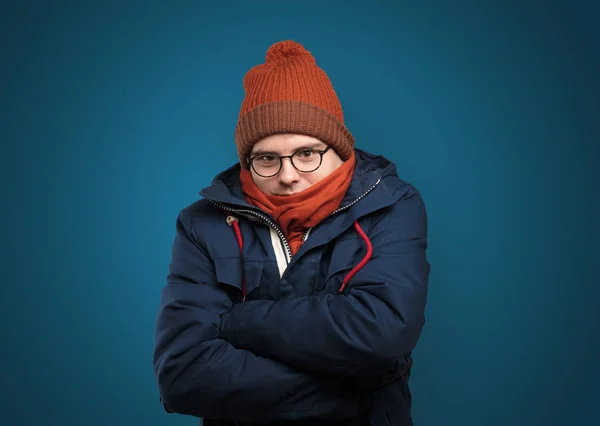 Handsome boy freezing in warm clothing — Stock Photo, Image