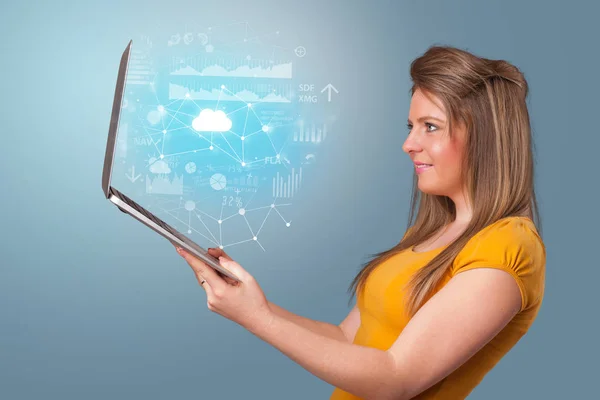 Woman holding laptop with cloud based system concept — Stock Photo, Image