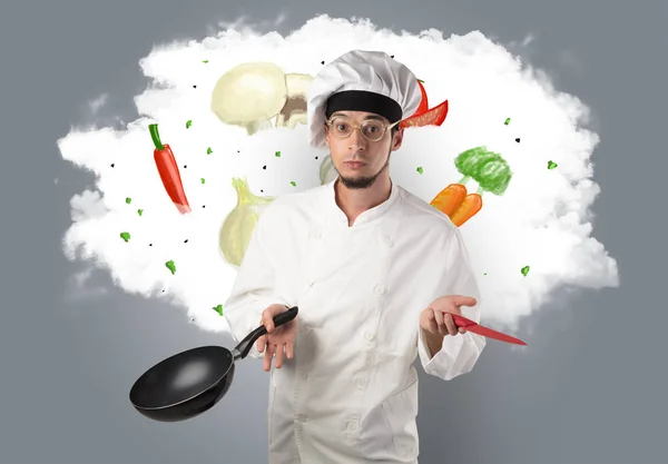 Légumes sur nuage avec cuisinier masculin — Photo