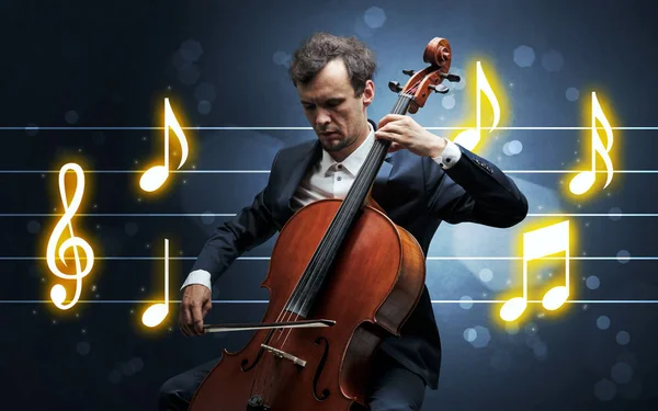 Young cellist with music sheet — Stock Photo, Image