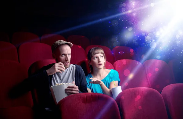 Romantic couple sitting at spectacle — Stock Photo, Image