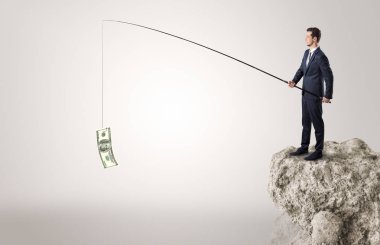 İşadamı Balık tutma Doları bir rock