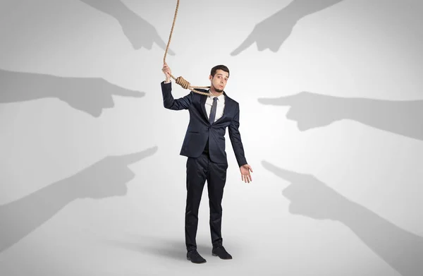 Businessman trying to suicide with pointing hands concept — Stock Photo, Image