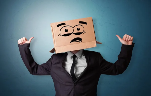 Man with cardboard head — Stock Photo, Image