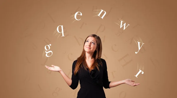 Person juggle with letters — Stock Photo, Image