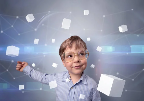 Cute kid with luminous cubes around — Stock Photo, Image