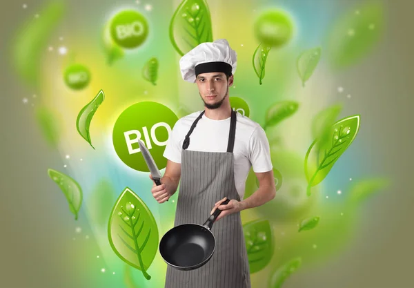 Bio bladeren concept en cook portret — Stockfoto