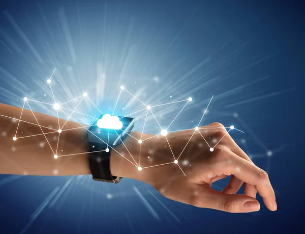 Female hand with smartwatch and cloudy icons — Stock Photo, Image
