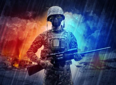 Silahlı asker toz fırtınanın ortasında duran