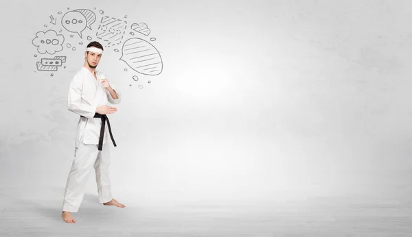 Entrenador de karate luchando con el concepto de símbolos garabateados —  Fotos de Stock