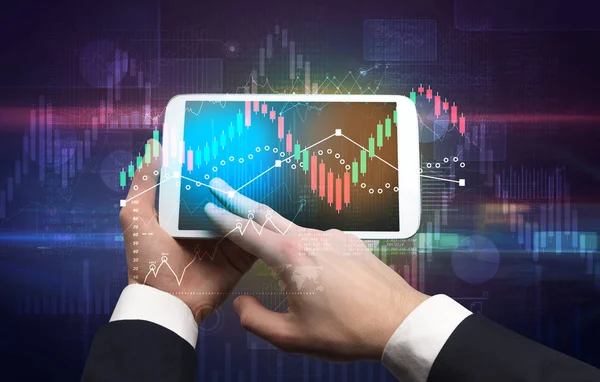 Hand holding tablet with global reports and stock market change concept — Stock Photo, Image