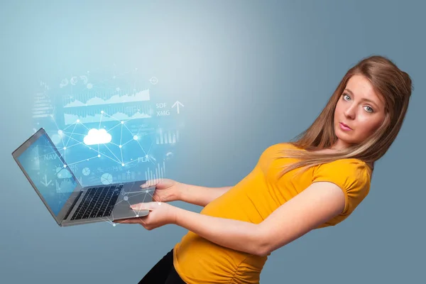 Woman holding laptop with cloud based system concept — Stock Photo, Image