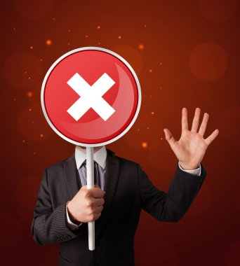 Tutan işadamı x işareti 